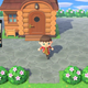 An Animal Crossing: New Horizons character exits their house, with overlay of YouTuber Ross Minor.
